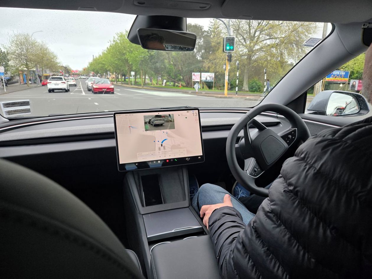 Tesla Model 3 with Full Self Driving (Supervised).