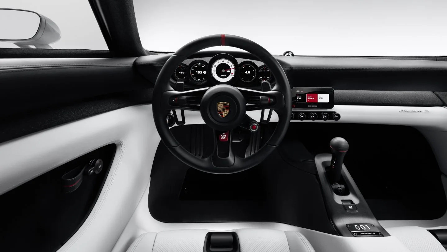 Mission S whole dashboard/steering-wheel/centre-console view.