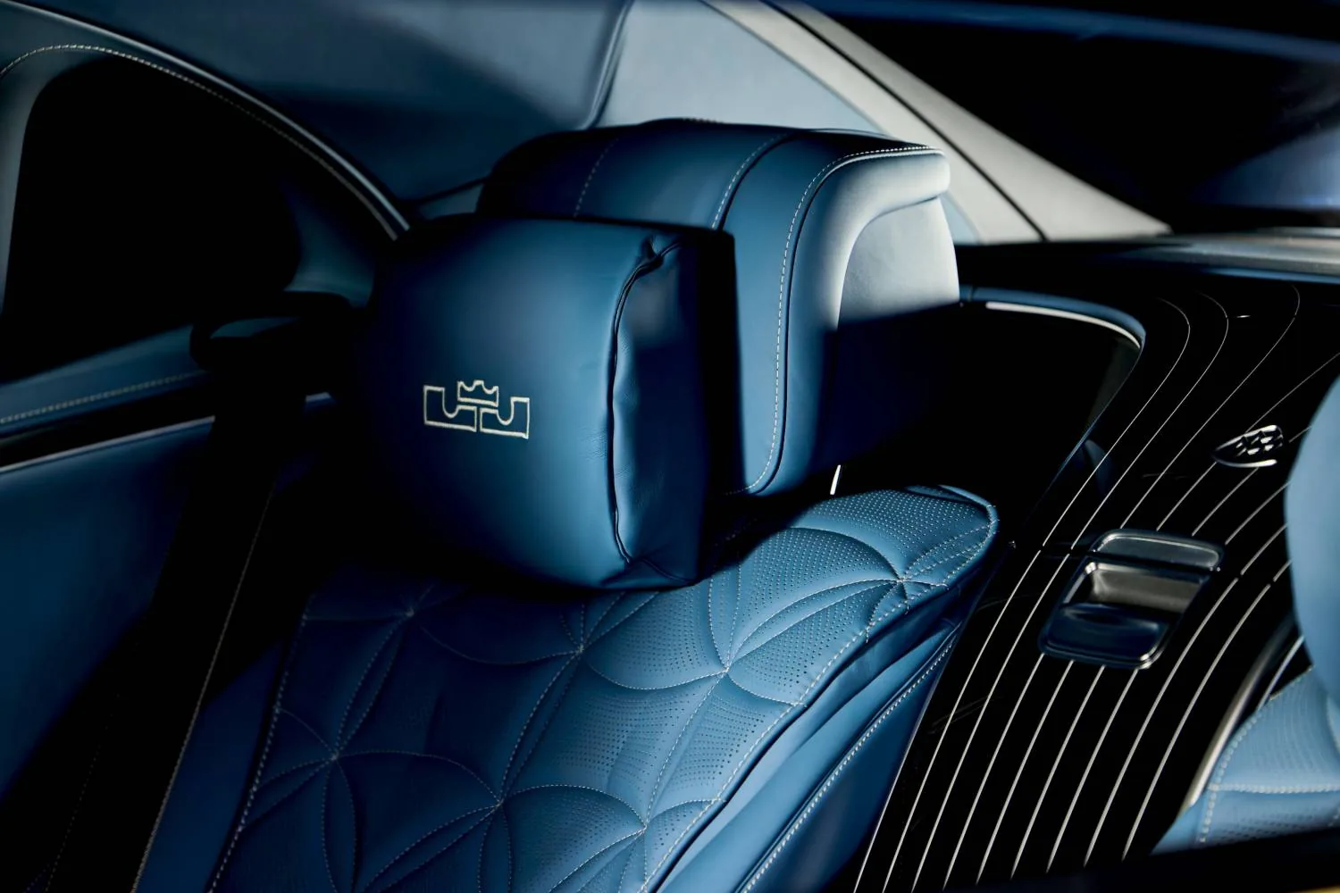 Blue Nappa headrest with personalised motif
